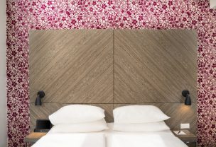 Double bed in family room at Arthotel ANA Boutique Six Vienna.